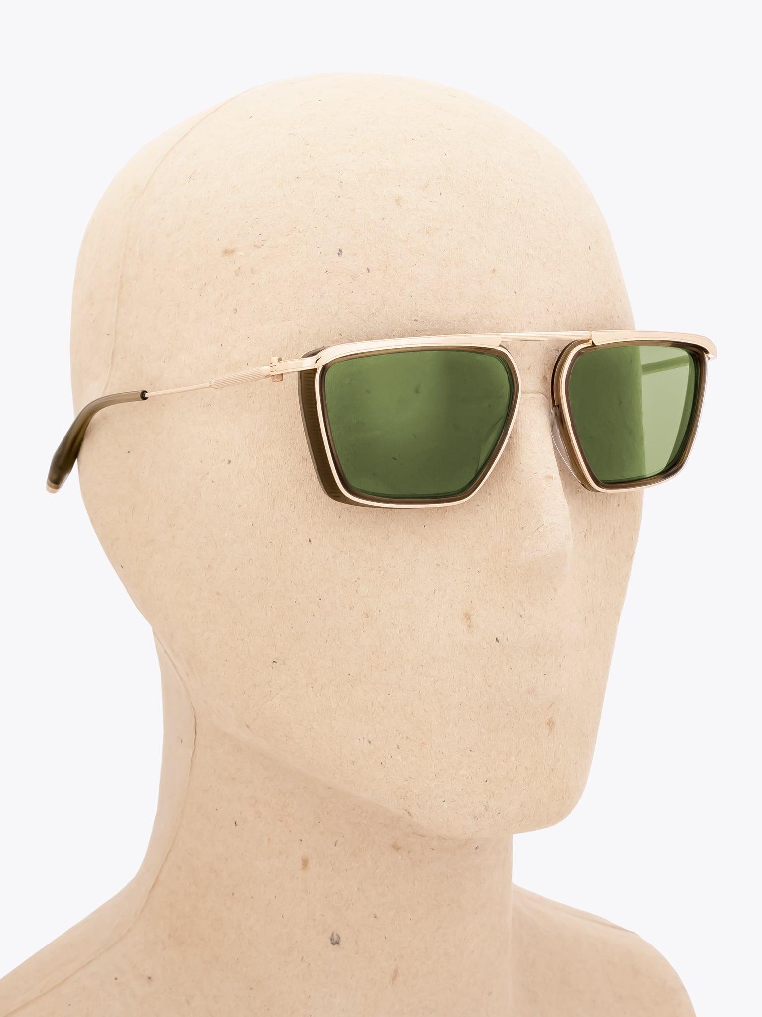 AKONI Ulysses — Sunglasses — Dark Olive worn on mannequin