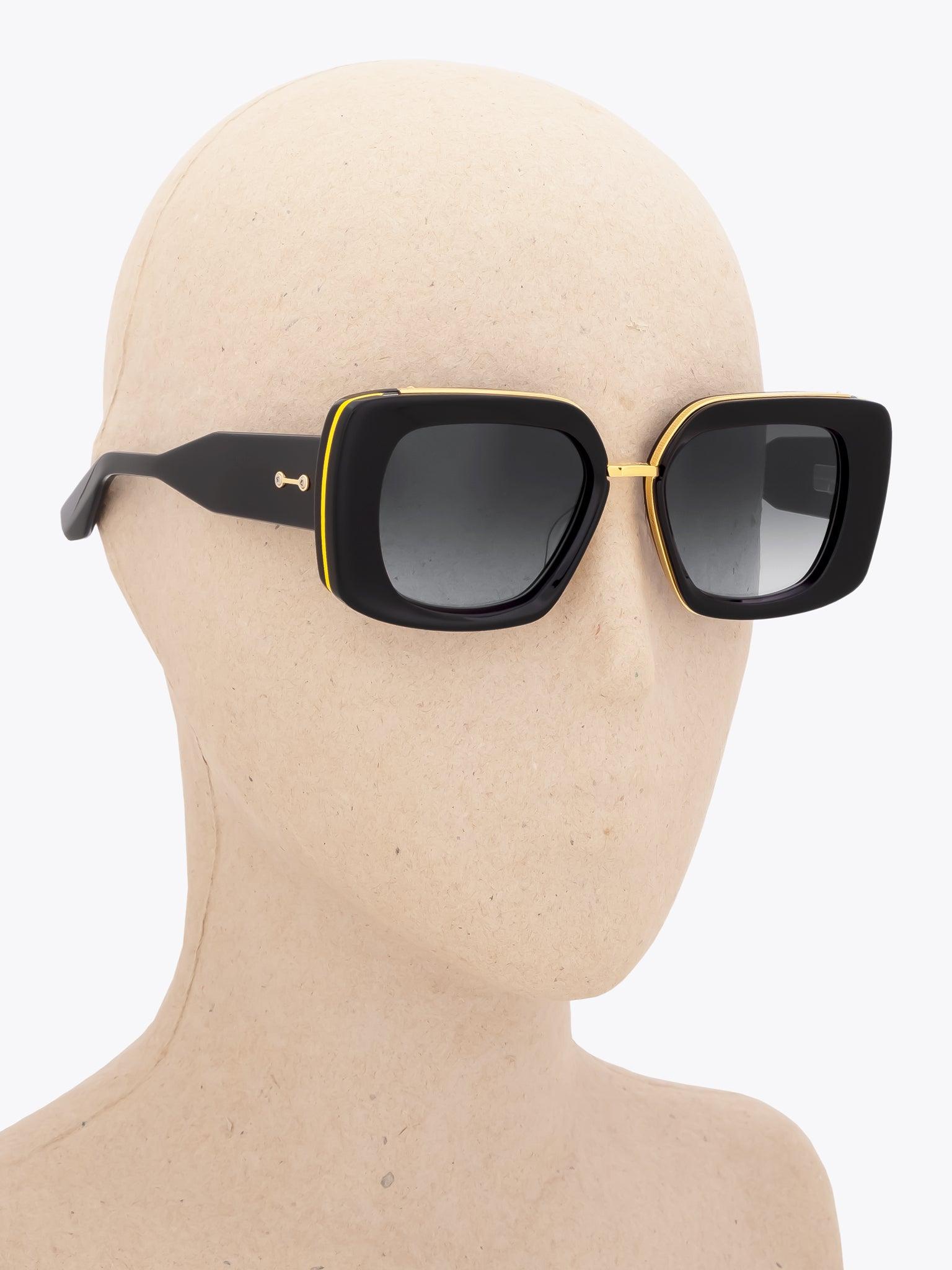 AKONI Virgo — Sunglasses — Solid Black worn on mannequin