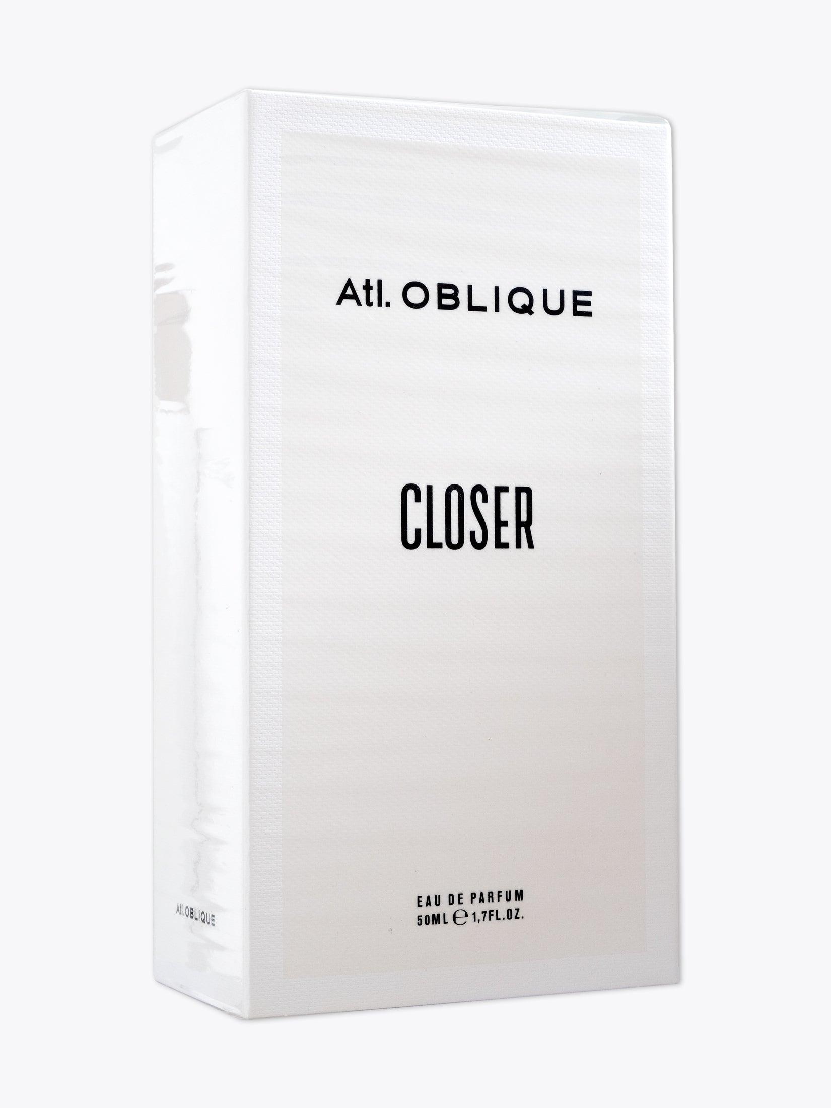 Atl. OBLIQUE Closer — Eau de Parfum — 50ml White paper three-quarter front view