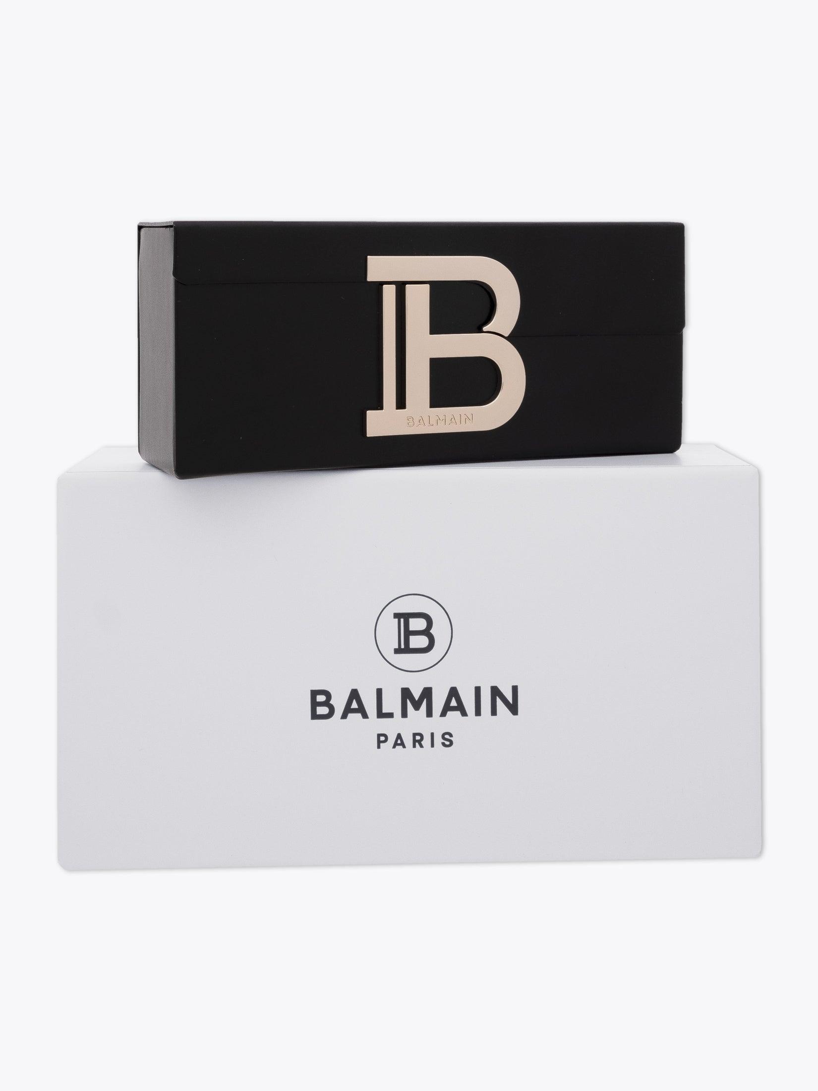 BALMAIN B-I — Sunglasses — Black box and case front view