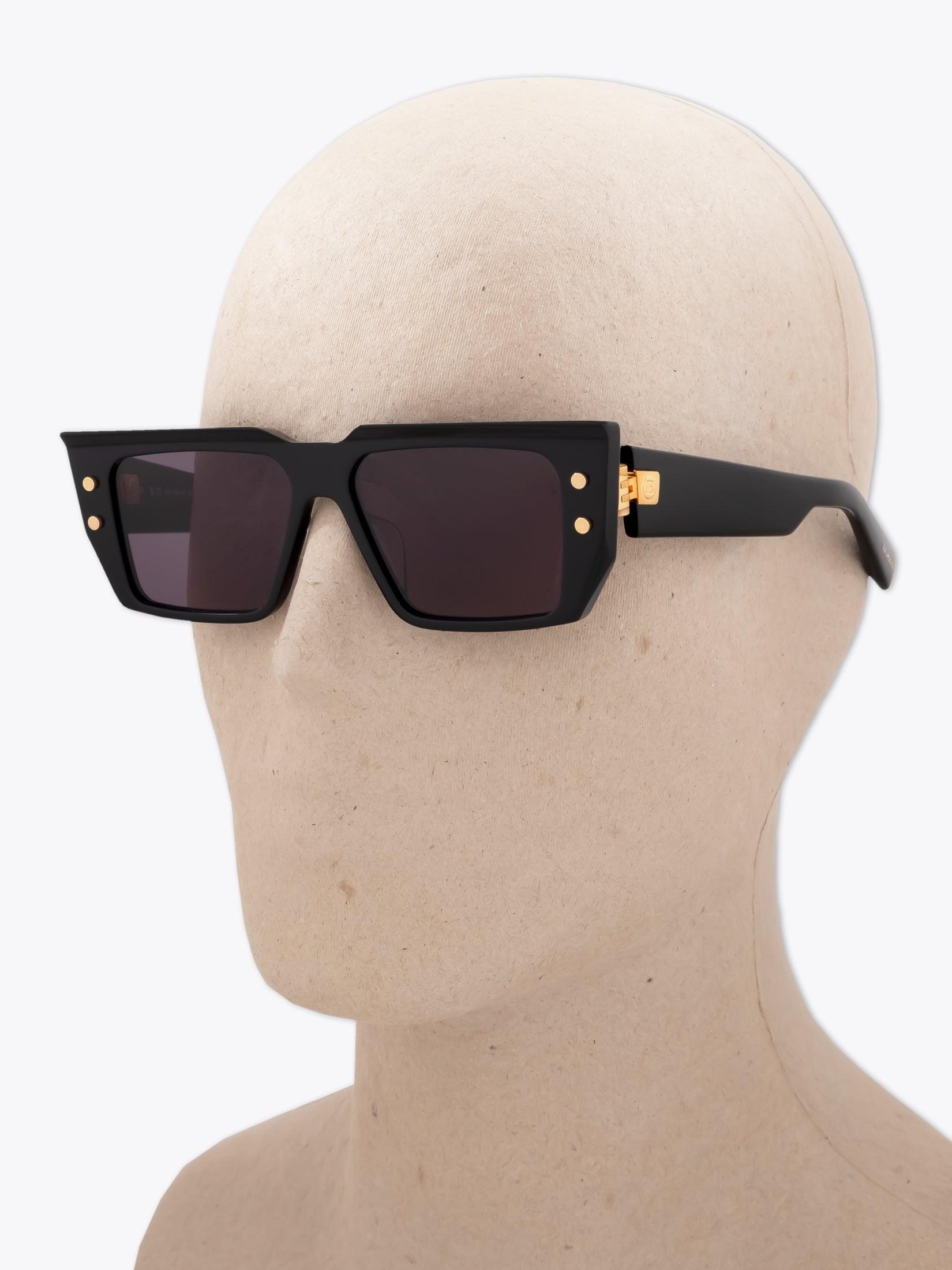 BALMAIN B-VI — Sunglasses — Black worn on mannequin three-quarter view