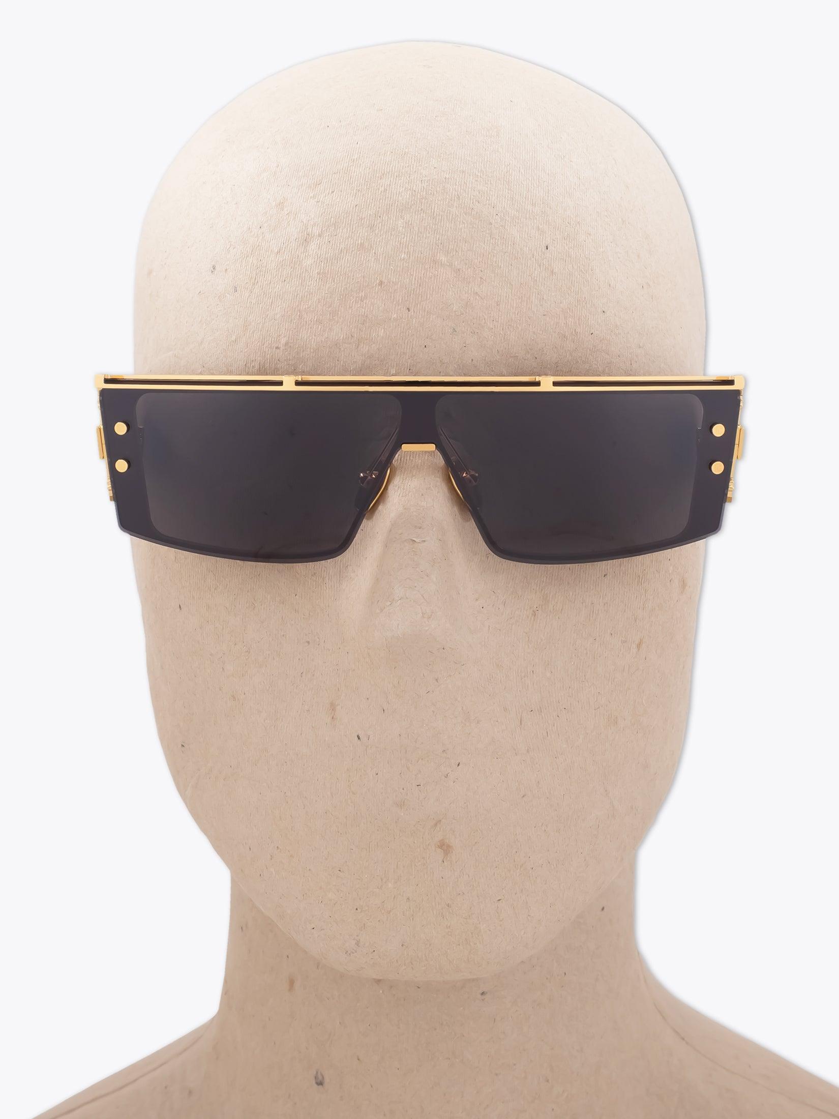 BALMAIN Wonder Boy III — Sunglasses — Gold / Black worn on mannequin front view