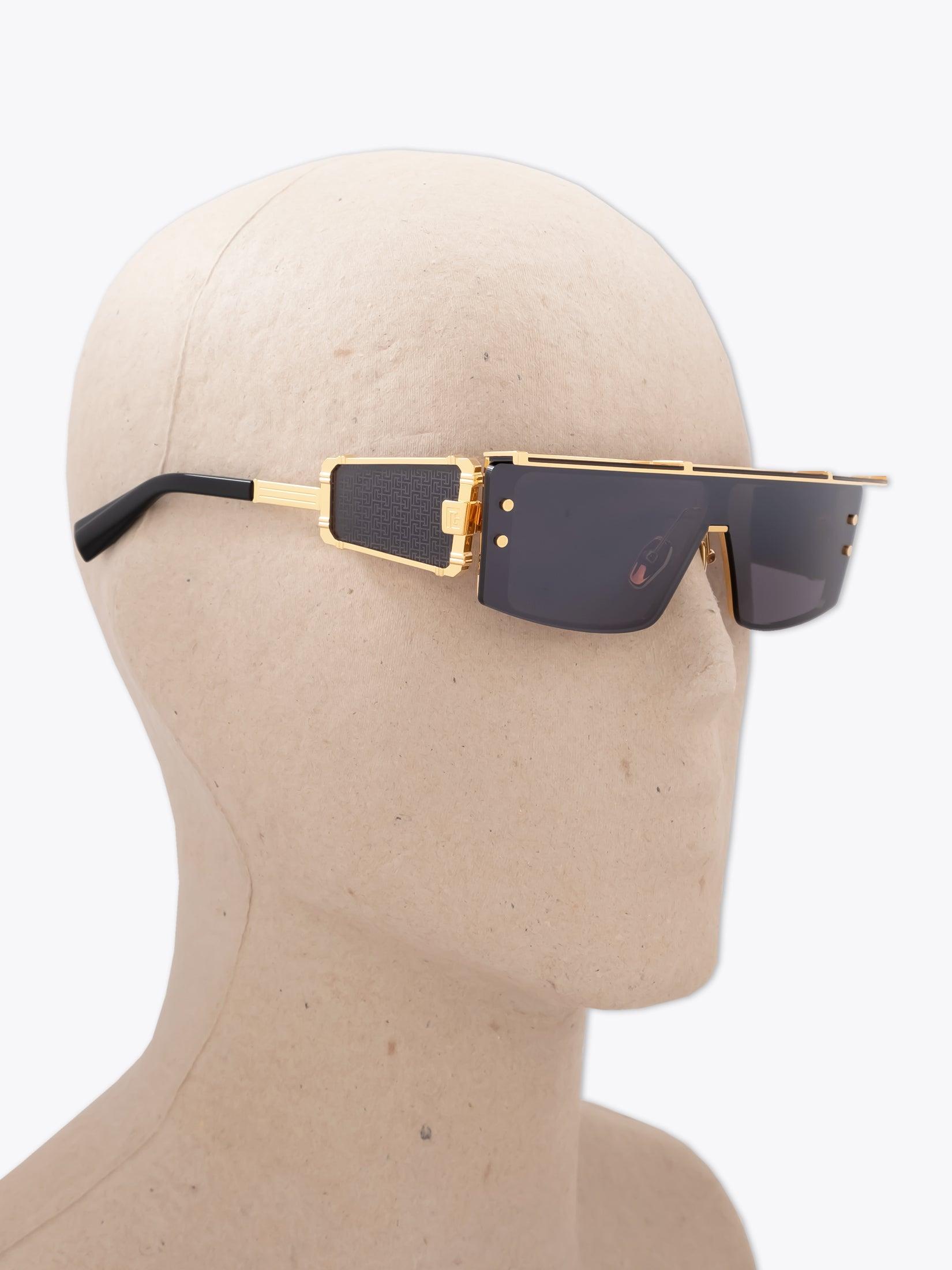 BALMAIN Wonder Boy III — Sunglasses — Gold / Black worn on mannequin three-quarter view right