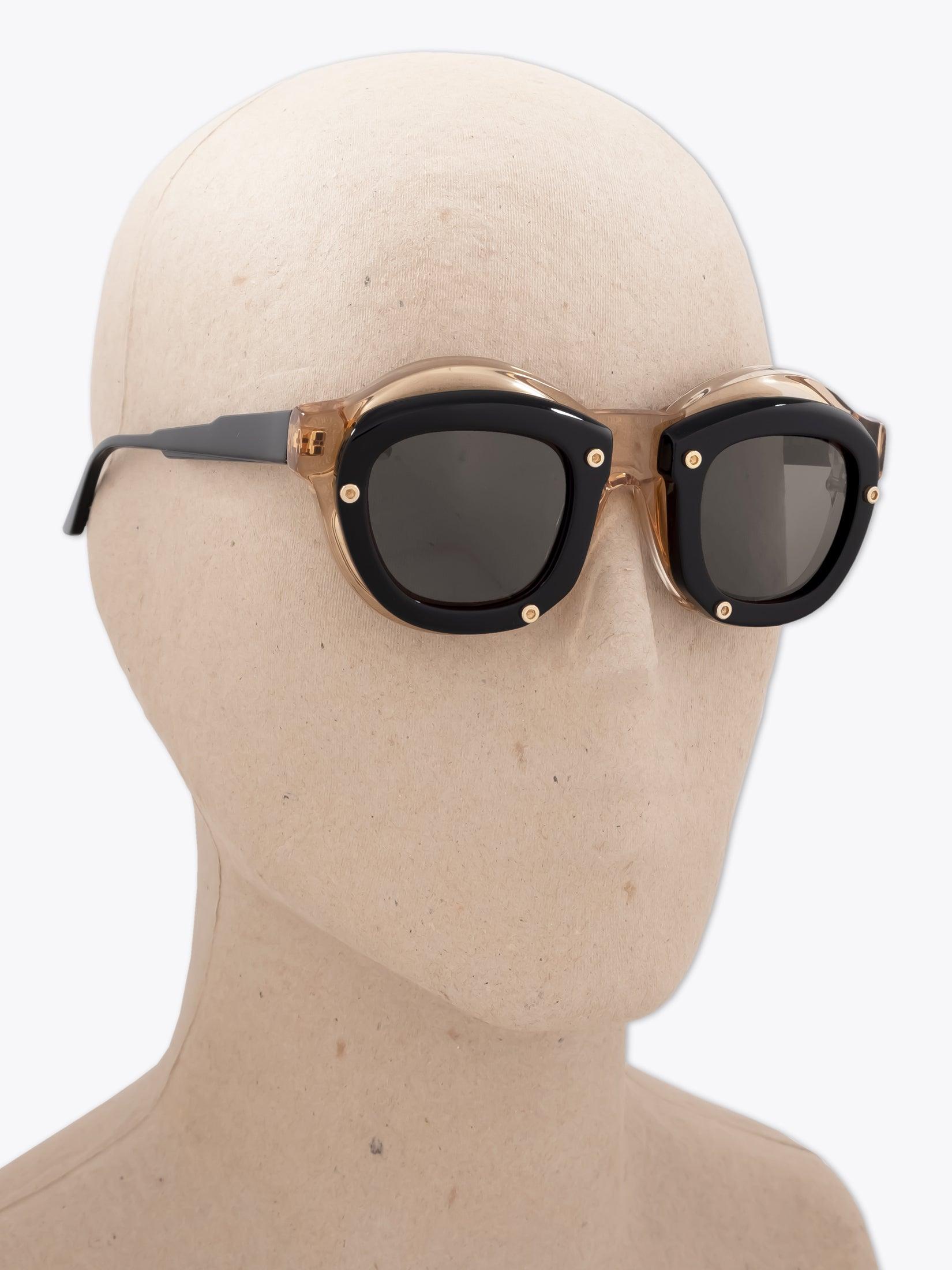 KUBORAUM Mask W1 — Sunglasses — Honey / Black worn on mannequin three-quarter right view