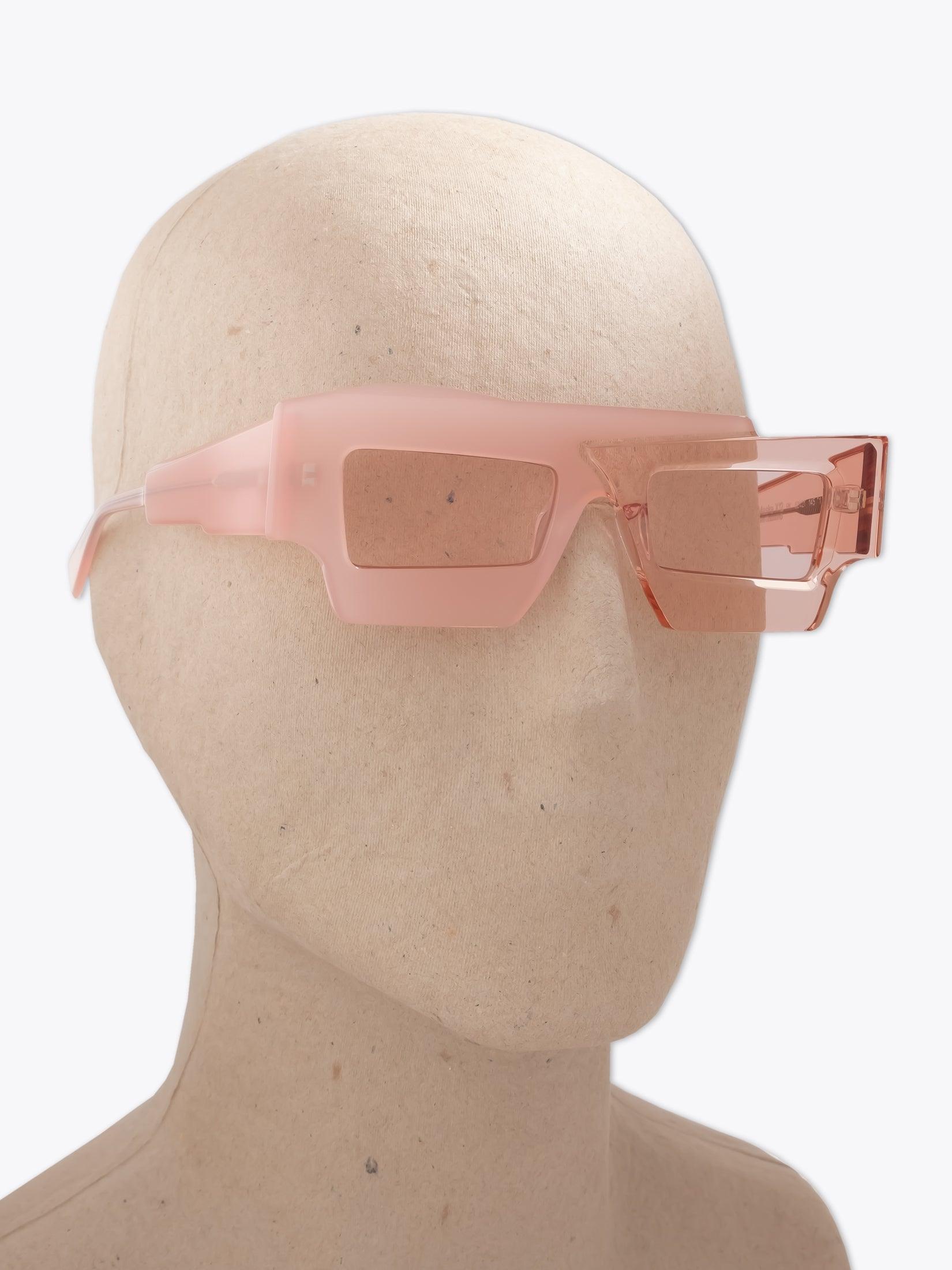 KUBORAUM Mask X12 — Sunglasses — Pink worn on mannequin three-quarter view