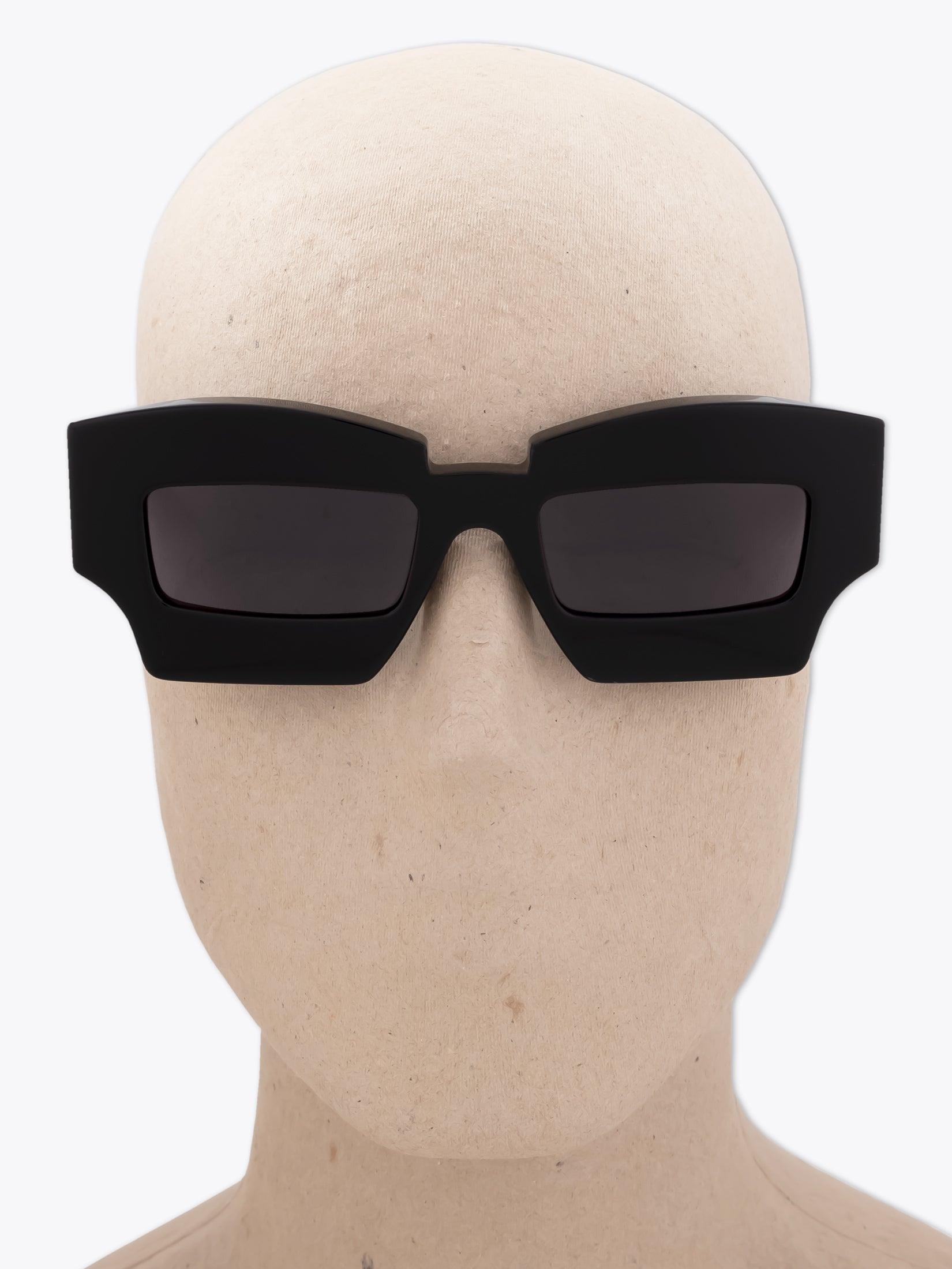 KUBORAUM Mask X6 — Sunglasses — Black worn on mannequin front view