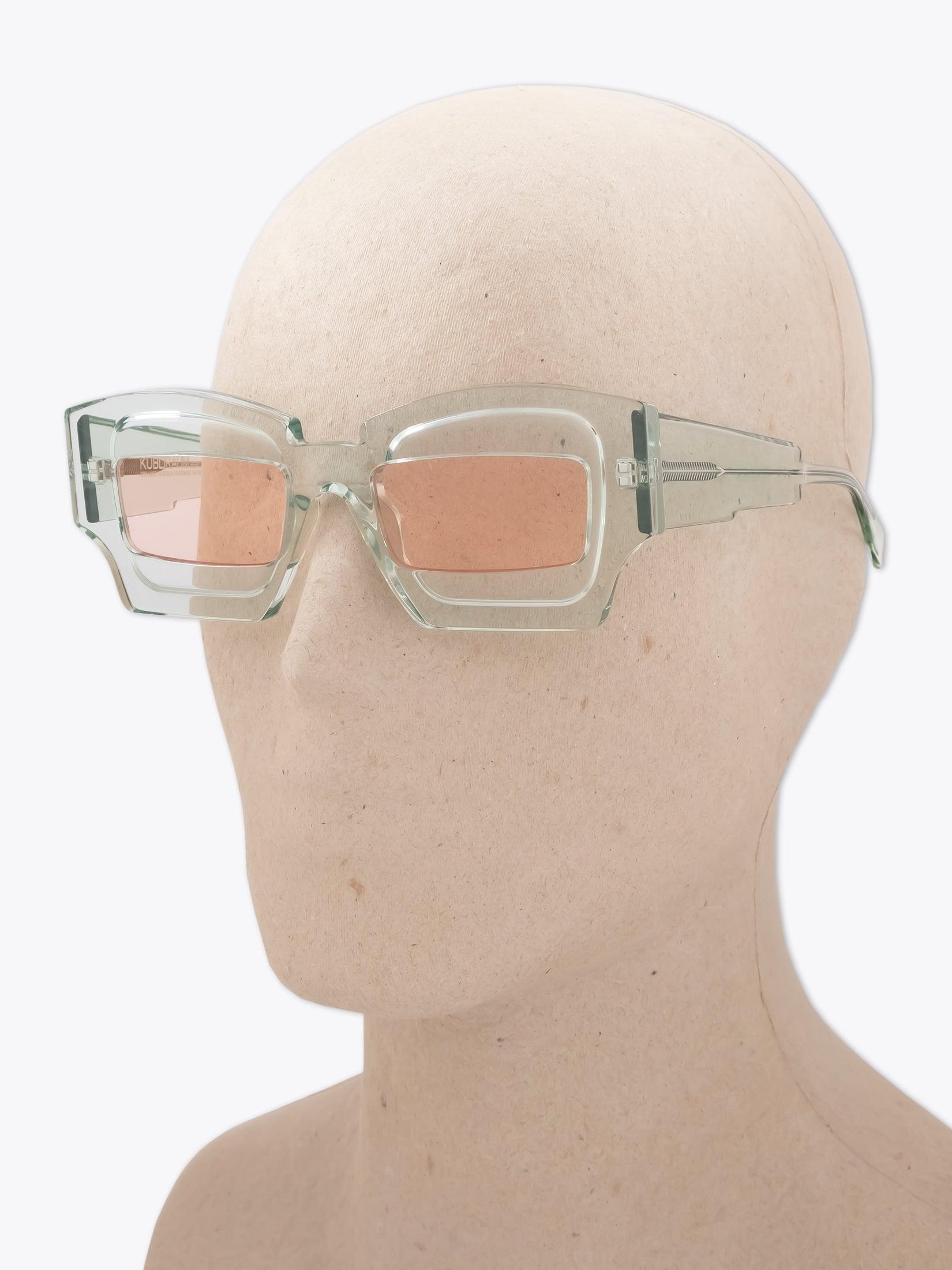 KUBORAUM Mask X6 — Sunglasses — Crystal Mint worn on mannequin three-quarter view